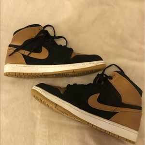 Air Jordan 1 retro high “Melo” black & gold